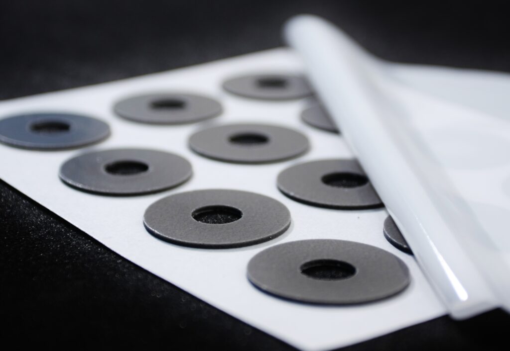 Individually packaged adhesive blanks